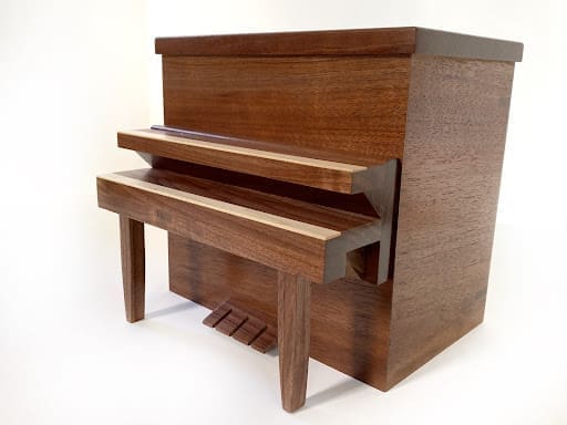 text on image reads: Custom Designed Wooden Cremation Urn